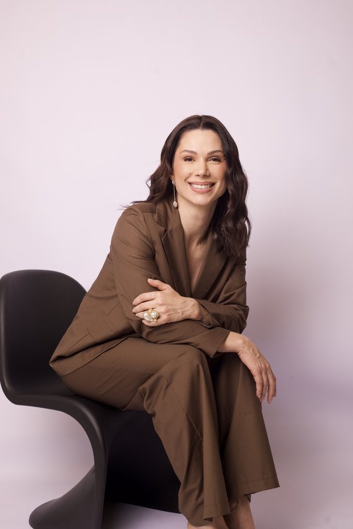 Laudiene Andrade sorrindo — fazendo aquilo que a IA não faz por mim